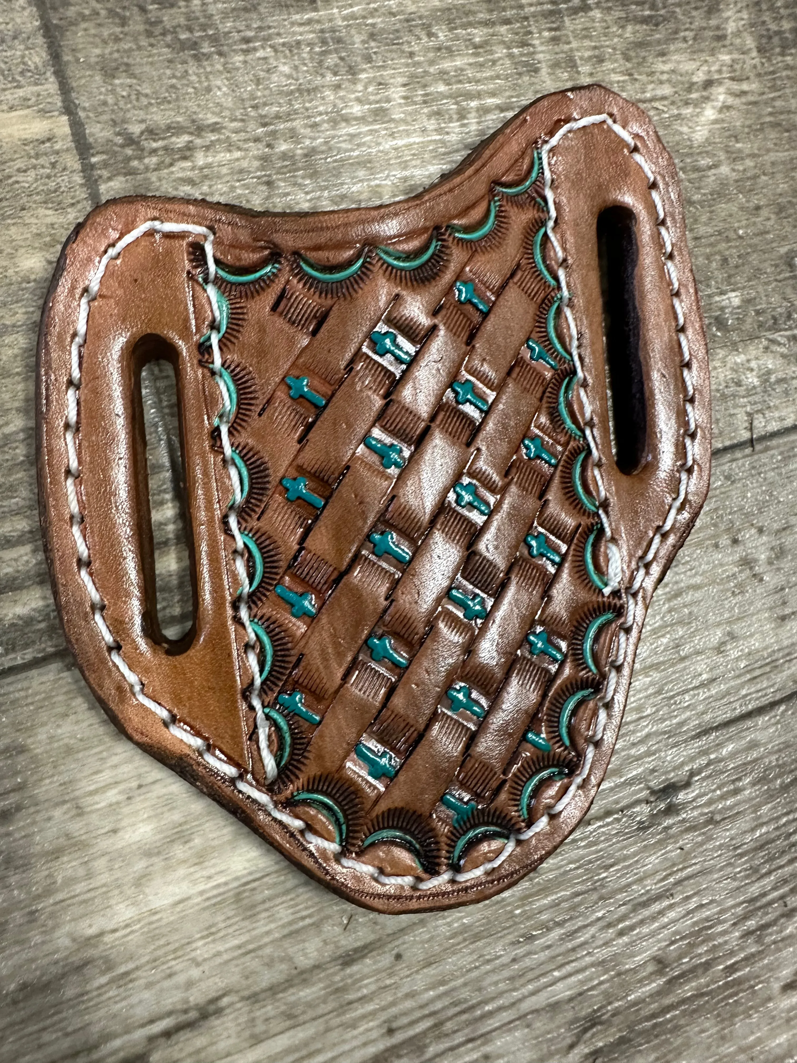 Hand tooled and painted cross basket weave pancake knife sheath