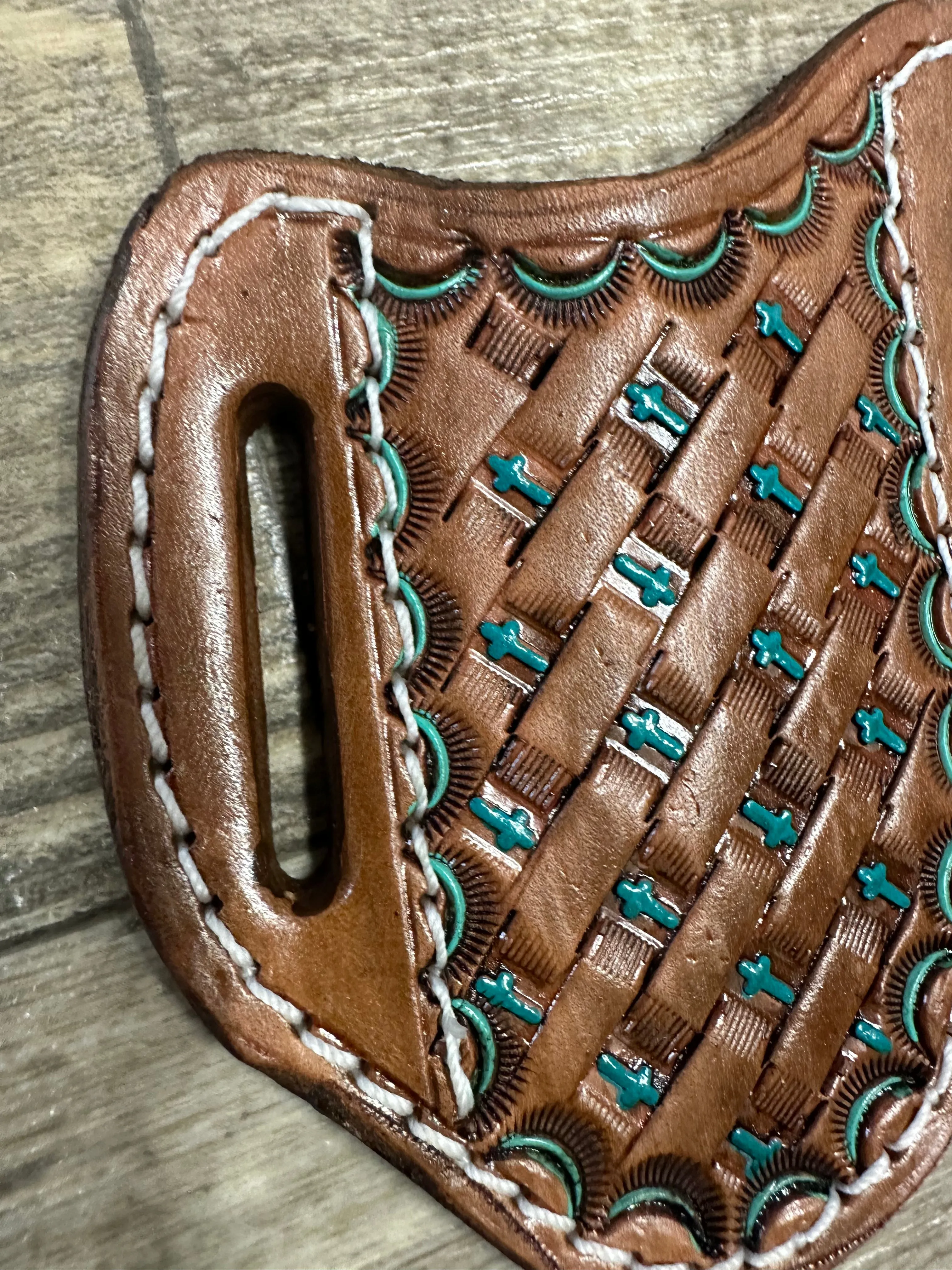 Hand tooled and painted cross basket weave pancake knife sheath